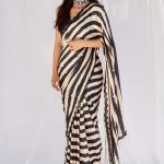 kajol-black-white-striped-saree-with-heavy-sequence-blouse