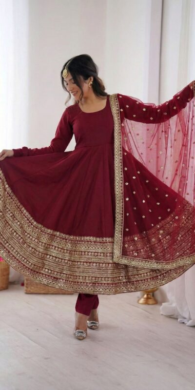 ZSR 3154 Maroon Roman Silk Gown with Embroidery Work & Lace Work. Grab it for ₹2449. Delivery 4-6 Working Days. Shop now. | Bollywood Gowns, Creative Gowns, Designer Gowns, Embroidered Gowns, Gowns, Party Wear Gowns