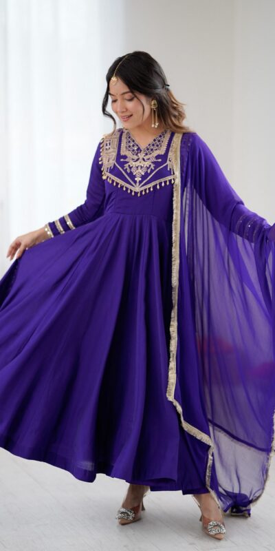 ZSR 3149 Purple Roman silk Gown Perfect for Wedding, Party, Sangeet, Haldi, Lohri – . Introductory Price ₹2099. Delivery 4-6 Working Days. Shop now. | Bollywood Gowns, Creative Gowns, Designer Gowns, Embroidered Gowns, Gowns, Party Wear Gowns