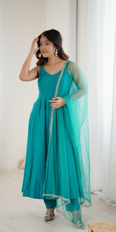 KB 285 Rama Color in Roman Silk Chanderi Mirror Work & Lace Work Gown . Best Price ₹1929. Delivery 4-6 Working Days. Shop now. | Bollywood Gowns, Creative Gowns, Designer Gowns, Embroidered Gowns, Gowns, Party Wear Gowns