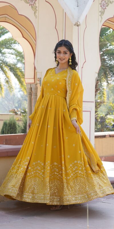 KA 1084 Yellow Faux Georgette Gown Perfect for Wedding, Party, Pooja, Festival Celebrations, Bridal Wear – . Festive Deal ₹2649. Delivery 4-6 Working | Bollywood Gowns, Creative Gowns, Designer Gowns, Embroidered Gowns, Gowns, Party Wear Gowns