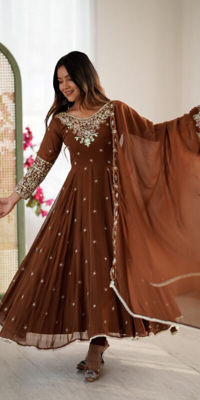 ZF 5012 Brown Blooming Faux Gown with Embroidery Work. Wedding, Party, Festive, Events Grab it for ₹2149. Delivery 4-6 Working Days. Shop now. | Bollywood Lehenga, Creative Lehenga, Designer Lehenga, Embroidered Lehenga, Lehenga, Party Wear Lehenga