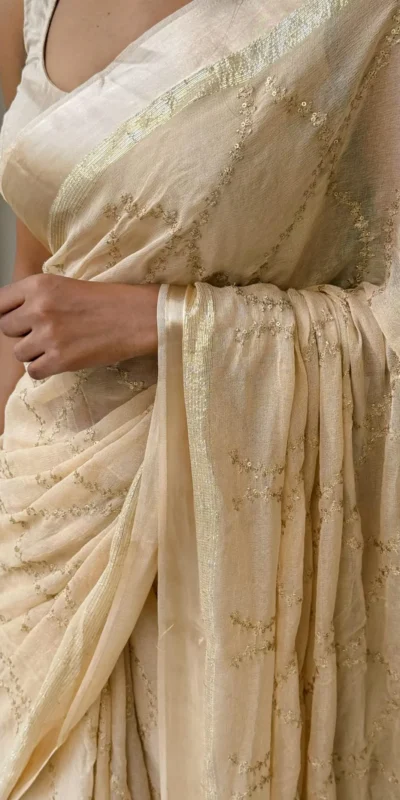 MS 505 Off White Viscose Satin Saree with Sequins Work & Embroidery Work. Special Price ₹1599. Delivery 4-6 Working Days. Shop now. | Bollywood Sarees, Creative Sarees, Designer Sarees, Embroidered Sarees, Ethnic Saree, Modern Digital sarees, Party Wear Sarees, Sarees