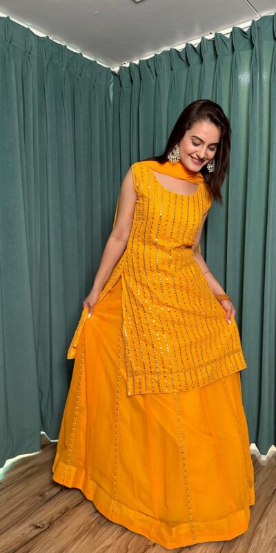 FB L299 Yellow in Color Georgette Mirror Work Lehenga Choli e. Introductory Price ₹2549. Delivery 4-6 Working Days. Shop now. | Bollywood Lehenga, Creative Lehenga, Designer Lehenga, Embroidered Lehenga, Lehenga, Party Wear Lehenga