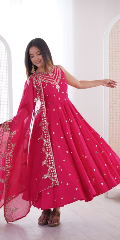 JF 038 Rani Pink Roman Silk Gown with Embroidery Work. Wedding, Party, Events, Navratri, Exclusive Offer ₹2149. Delivery 4-6 Working Days. Shop now. | Bollywood Gowns, Creative Gowns, Designer Gowns, Embroidered Gowns, Gowns, Party Wear Gowns