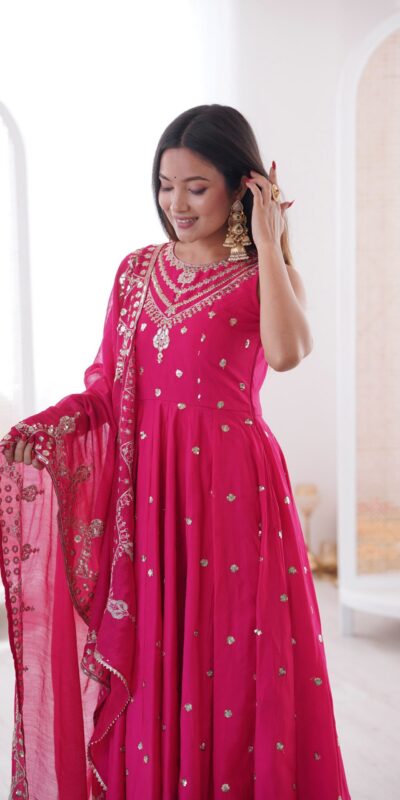 JF 038 Rani Pink Roman Silk Gown with Embroidery Work. Wedding, Party, Events, Navratri, Exclusive Offer ₹2149. Delivery 4-6 Working Days. Shop now. | Bollywood Gowns, Creative Gowns, Designer Gowns, Embroidered Gowns, Gowns, Party Wear Gowns