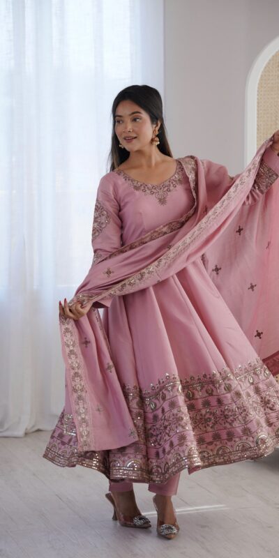 ZF 5016 Dusty Pink Roman Silk Gown with Embroidery Work. Wedding, Party, Festive, Events, Navratri, Offer ₹2499. Delivery 4-6 Working Days. Shop now. | Bollywood Gowns, Creative Gowns, Designer Gowns, Embroidered Gowns, Gowns, Party Wear Gowns