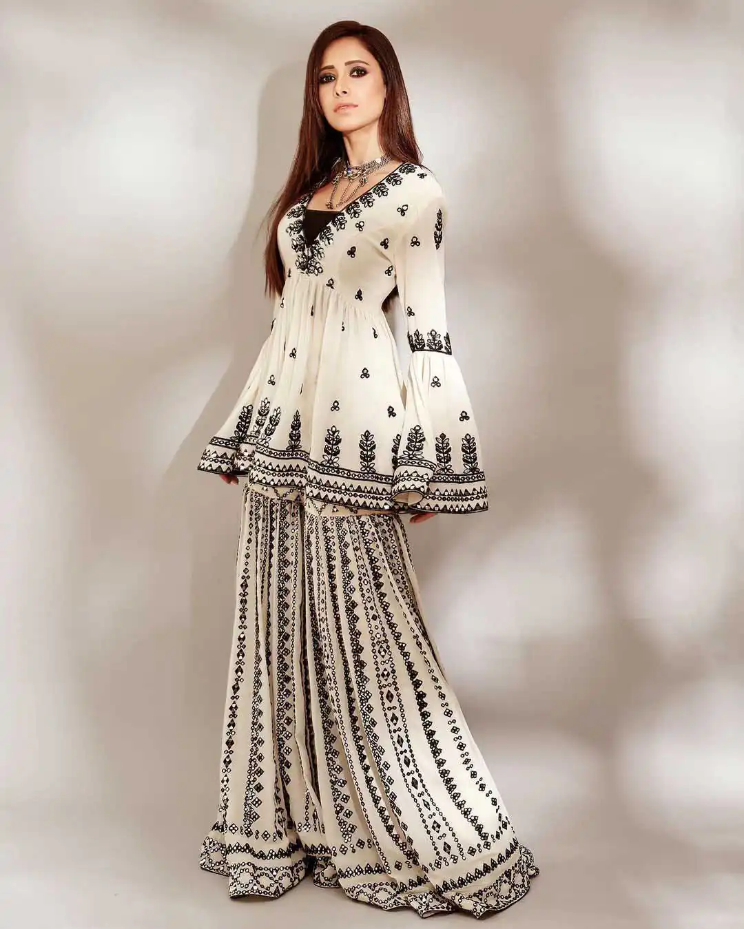 NSR 1139 White & Black Top : Heavy Georgette Top Work : Embroidery Work With Embroidered Bell Sleeve Party, Daily, Wedding, Events @ | Casual Suits, Creative suits, Designer Suits, Palazzo Suits, Party Wear Suits, Salwar suit, Straight Suits