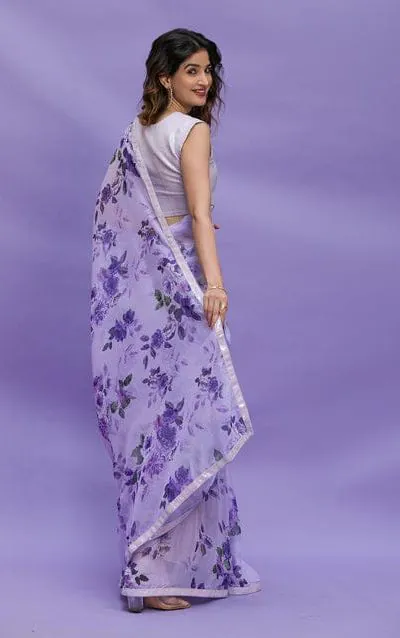 RS 45 Violet Color Floral Digital Printed Georgette Lace Border Saree Casual, Party, Wedding, Festive, Events . Expected Delivery 4-6 Working Days @1799/- | Bollywood Sarees, Creative Sarees, Designer Sarees, Embroidered Sarees, Ethnic Saree, Modern Digital sarees, Party Wear Sarees, Sarees