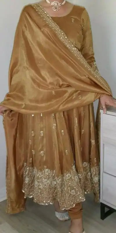 ZF 412 Gold Color Barbari Silk With Embroidery Work Gown Casual, Wedding, Party, Festive, Events Etc.4-6 Working Days@ 2149/-only | Bollywood Gowns, Creative Gowns, Designer Gowns, Embroidered Gowns, Gowns, Party Wear Gowns