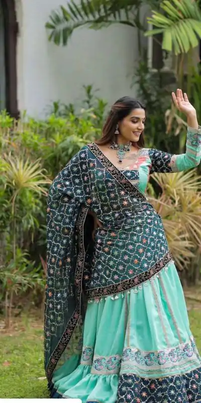 KF 1597 Firozi Silk with Cowrie Work & Embroidery Work Lehenga Choli . Grab it for ₹2599. Delivery 4-6 Working Days. Shop now. | Bollywood Lehenga, Creative Lehenga, Designer Lehenga, Embroidered Lehenga, Lehenga, Party Wear Lehenga