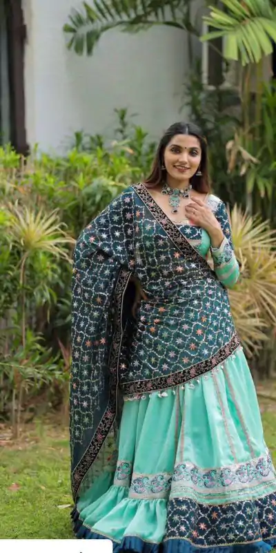 KF 1597 Firozi Silk with Cowrie Work & Embroidery Work Lehenga Choli . Grab it for ₹2599. Delivery 4-6 Working Days. Shop now. | Bollywood Lehenga, Creative Lehenga, Designer Lehenga, Embroidered Lehenga, Lehenga, Party Wear Lehenga