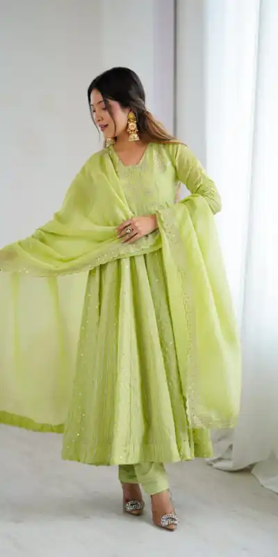 SRK 5293 Pista With Crunchy Silk With Fully Flair with Lace Work & Embroidery Work Anarkali Gown . Introductory Price ₹2149. Delivery 4-6 Worki | Bollywood Gowns, Creative Gowns, Designer Gowns, Embroidered Gowns, Gowns, Party Wear Gowns