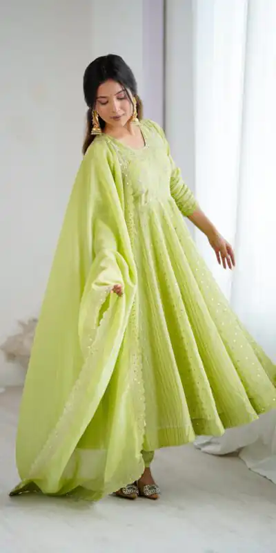 SRK 5293 Pista With Crunchy Silk With Fully Flair with Lace Work & Embroidery Work Anarkali Gown . Introductory Price ₹2149. Delivery 4-6 Worki | Bollywood Gowns, Creative Gowns, Designer Gowns, Embroidered Gowns, Gowns, Party Wear Gowns