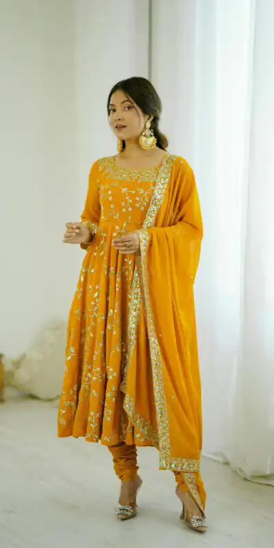 SRK 5299 Yellow Faux Georgette With Sequence Work Perfect for Wedding, Party, Temple Visit, Ganesh Chaturthi Festive, Events, 4-6 Working Days At 2149 | Bollywood Gowns, Creative Gowns, Designer Gowns, Embroidered Gowns, Gowns, Party Wear Gowns