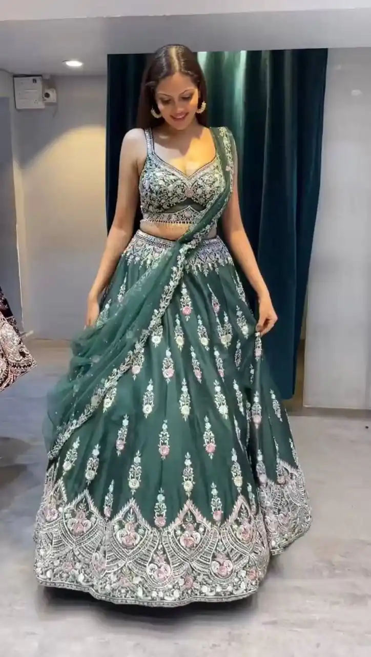 KF 1623 Green Faux Georgette with Cut Work Lehenga Choli . Wedding, Party, Festive, Events, Delivery 4-6 Working Days. Shop now. | Bollywood Lehenga, Creative Lehenga, Designer Lehenga, Embroidered Lehenga, Lehenga, Party Wear Lehenga