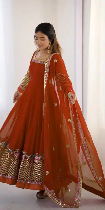 ZF 5010 Rust Georgette Gown Perfect for Wedding, Party, Pooja, Ethnic Day, Karwa Chauth – . Best Price ₹2049. Delivery 4-6 Working Days. Shop now. | Designer Suits, Jump Suits, Casual Suits, Creative suits, Palazzo Suits, Party Wear Suits, Patiala Suits, Salwar suit, Straight Suits