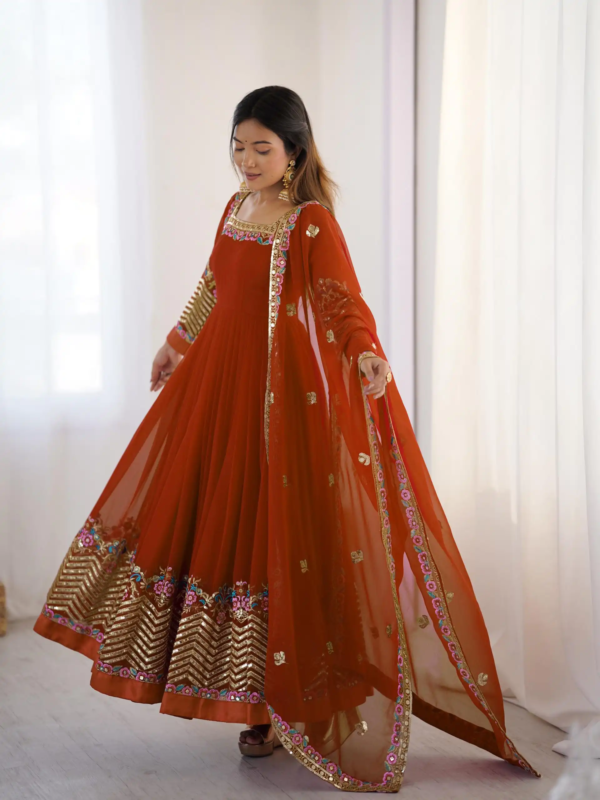 ZF 5010 Rust Georgette Gown Perfect for Wedding, Party, Pooja, Ethnic Day, Karwa Chauth – . Best Price ₹2049. Delivery 4-6 Working Days. Shop now. | Designer Suits, Jump Suits, Casual Suits, Creative suits, Palazzo Suits, Party Wear Suits, Patiala Suits, Salwar suit, Straight Suits