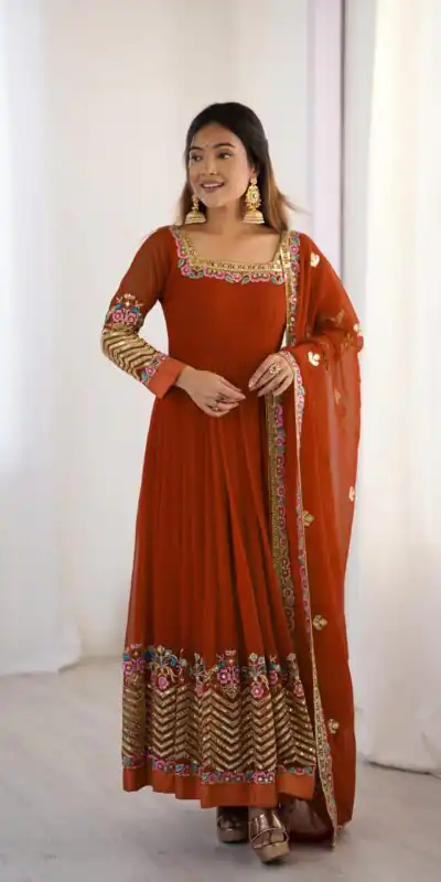 ZF 5010 Rust Georgette Gown Perfect for Wedding, Party, Pooja, Ethnic Day, Karwa Chauth – . Best Price ₹2049. Delivery 4-6 Working Days. Shop now. | Designer Suits, Jump Suits, Casual Suits, Creative suits, Palazzo Suits, Party Wear Suits, Patiala Suits, Salwar suit, Straight Suits