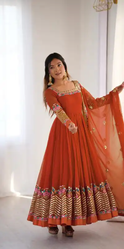 ZF 5010 Rust Georgette Gown Perfect for Wedding, Party, Pooja, Ethnic Day, Karwa Chauth – . Best Price ₹2049. Delivery 4-6 Working Days. Shop now. | Designer Suits, Jump Suits, Casual Suits, Creative suits, Palazzo Suits, Party Wear Suits, Patiala Suits, Salwar suit, Straight Suits