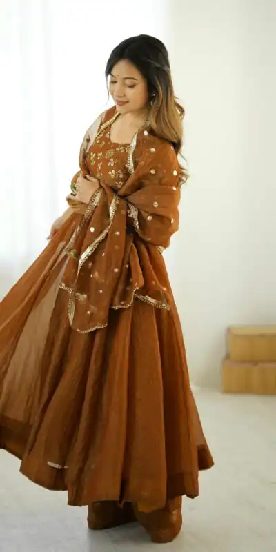 SRK 5290 Mustered Crunchy Silk Gown Perfect for Wedding, Party, Pongal, Traditional Day, Reception Get it for ₹1999. Delivery 4-6 Working Days. Shop now. | Bollywood Gowns, Creative Gowns, Designer Gowns, Embroidered Gowns, Gowns, Party Wear Gowns