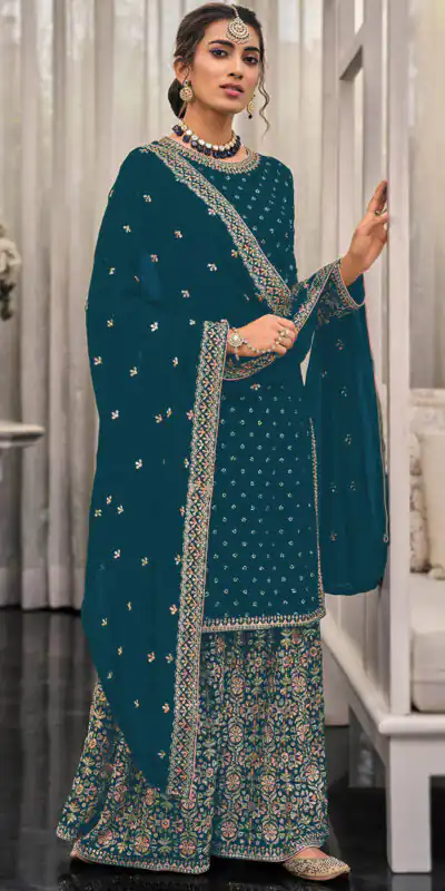 FC 1448 Teal Georgette Salwar Suit with Embroidery Work & Lace Work. Exclusive Offer ₹2599. Delivery 4-6 Working Days. Shop now. | Designer Suits, Jump Suits, Tops & Bottoms, Track Suits, Trendy Wear, Casual Suits, Creative suits, Palazzo Suits, Party Wear Suits, Patiala Suits, Salwar suit, Straight Suits