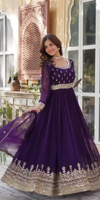 KA 1144 Dark Purple Faux Blooming Gown with Embroidery Work & Zari Work. Exclusive Offer ₹2449. Delivery 4-6 Working Days. Shop now. | Bollywood Gowns, Creative Gowns, Designer Gowns, Embroidered Gowns, Gowns, Party Wear Gowns