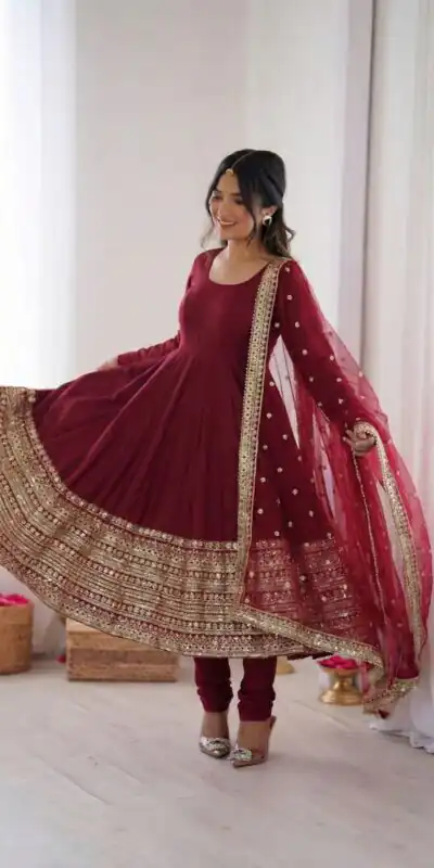 ZSR 3154 Maroon Roman Silk Gown with Embroidery Work & Lace Work. Grab it for ₹2449. Delivery 4-6 Working Days. Shop now. | Bollywood Gowns, Creative Gowns, Designer Gowns, Embroidered Gowns, Gowns, Party Wear Gowns