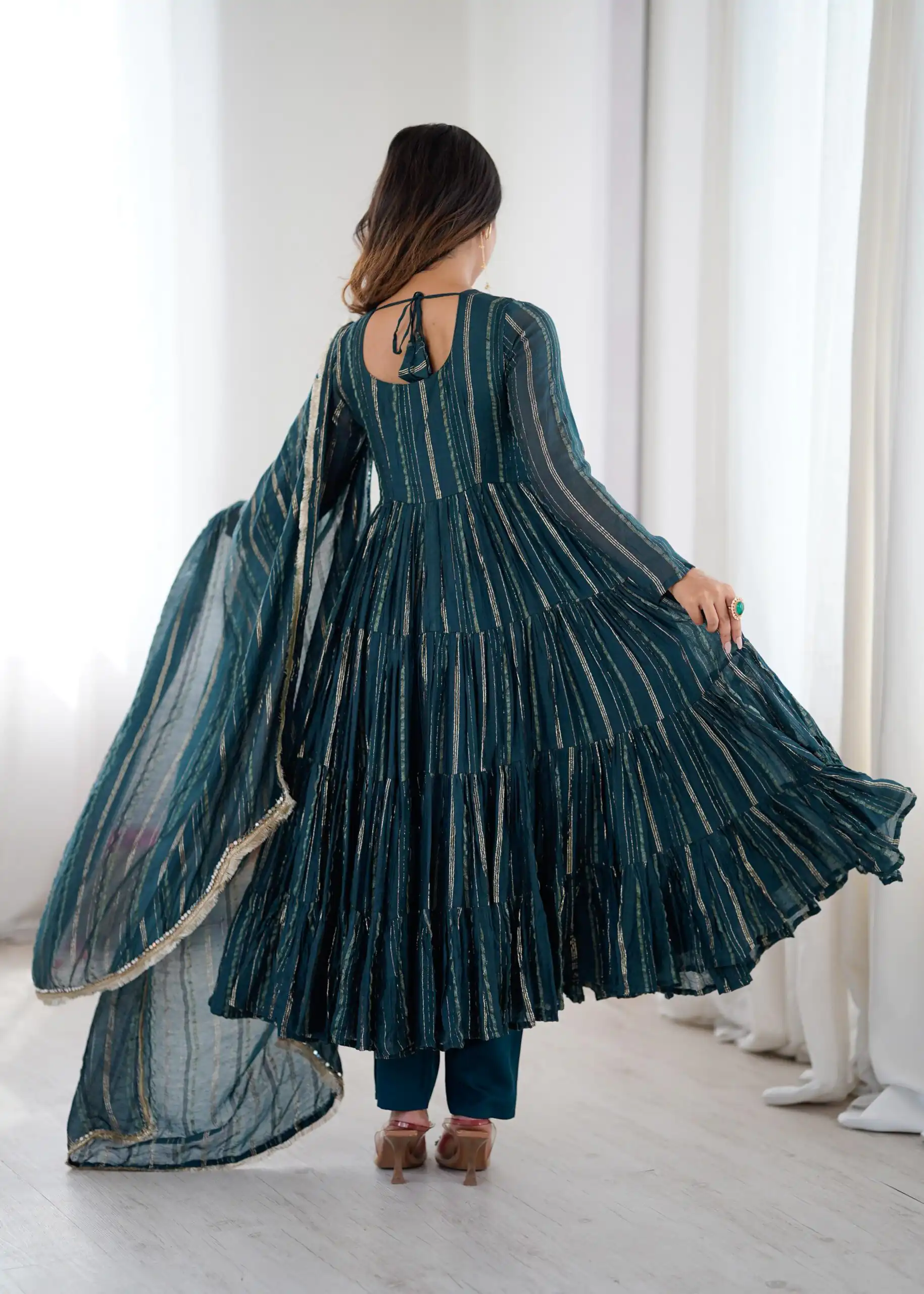 SRK 5305 Peacock Blue Color Mal Chanderi Gown with Mirror Work & Lace Work. Grab it for ₹2399. Delivery 4-6 Working Days. Shop now. | Bollywood Gowns, Creative Gowns, Designer Gowns, Embroidered Gowns, Gowns, Party Wear Gowns