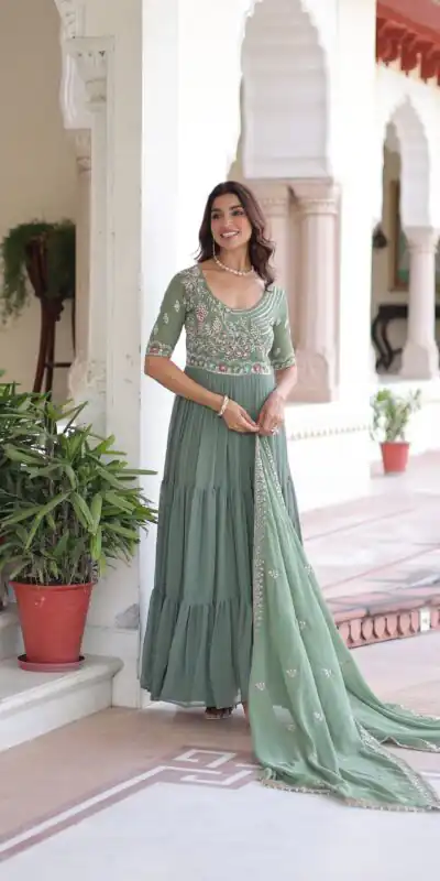 KA 1213 Pista Faux Blooming Gown with Embroidery Work & Sequins Work. Best Price ₹2449. Delivery 4-6 Working Days. Shop now. | Bollywood Gowns, Creative Gowns, Designer Gowns, Embroidered Gowns, Gowns, Party Wear Gowns
