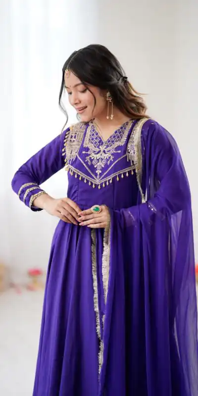 ZSR 3149 Purple Roman silk Gown Perfect for Wedding, Party, Sangeet, Haldi, Lohri – . Introductory Price ₹2099. Delivery 4-6 Working Days. Shop now. | Bollywood Gowns, Creative Gowns, Designer Gowns, Embroidered Gowns, Gowns, Party Wear Gowns