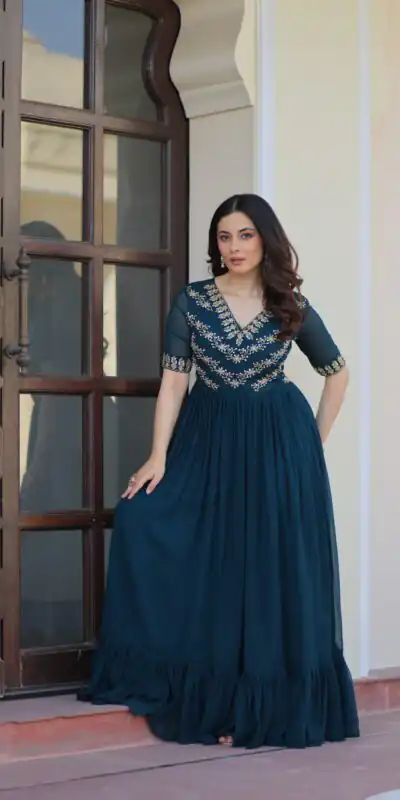 KA 1172 Teal in Faux Blooming Embroidery Work & Sequins Work Gown . Affordable Price ₹1749. Delivery 4-6 Working Days. Shop now. | Bollywood Gowns, Creative Gowns, Designer Gowns, Embroidered Gowns, Gowns, Party Wear Gowns