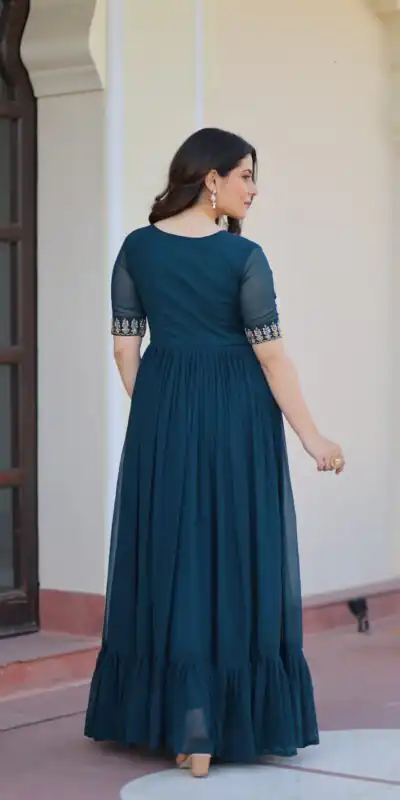 KA 1172 Teal in Faux Blooming Embroidery Work & Sequins Work Gown . Affordable Price ₹1749. Delivery 4-6 Working Days. Shop now. | Bollywood Gowns, Creative Gowns, Designer Gowns, Embroidered Gowns, Gowns, Party Wear Gowns