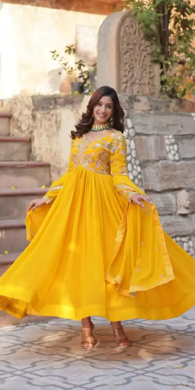 KA 1147 Yellow in Color Faux Blooming Embroidery Work & Zari Work Gown . Grab it for ₹2049. Delivery 4-6 Working Days. Shop now. | Bollywood Gowns, Creative Gowns, Designer Gowns, Embroidered Gowns, Gowns, Party Wear Gowns
