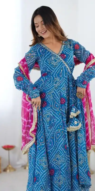 ST 1116 Blue Faux Georgette Gown with Digital Print & Embroidery Work. Exclusive Offer ₹1999. Delivery 4-6 Working Days. Shop now. | Bollywood Gowns, Creative Gowns, Designer Gowns, Embroidered Gowns, Gowns, Party Wear Gowns