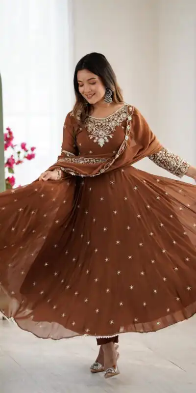 ZF 5012 Brown Blooming Faux Gown with Embroidery Work. Wedding, Party, Festive, Events Grab it for ₹2149. Delivery 4-6 Working Days. Shop now. | Bollywood Lehenga, Creative Lehenga, Designer Lehenga, Embroidered Lehenga, Lehenga, Party Wear Lehenga
