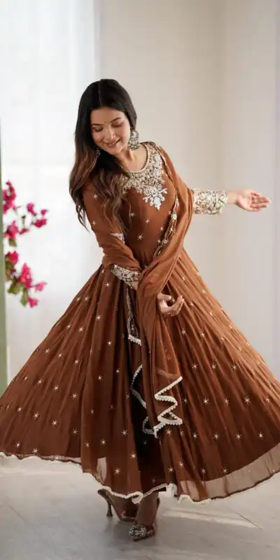 ZF 5012 Brown Blooming Faux Gown with Embroidery Work. Wedding, Party, Festive, Events Grab it for ₹2149. Delivery 4-6 Working Days. Shop now. | Bollywood Lehenga, Creative Lehenga, Designer Lehenga, Embroidered Lehenga, Lehenga, Party Wear Lehenga