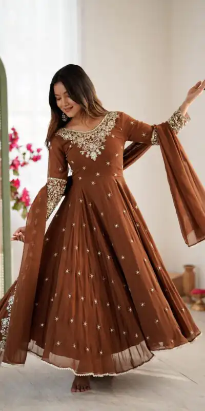 ZF 5012 Brown Blooming Faux Gown with Embroidery Work. Wedding, Party, Festive, Events Grab it for ₹2149. Delivery 4-6 Working Days. Shop now. | Bollywood Lehenga, Creative Lehenga, Designer Lehenga, Embroidered Lehenga, Lehenga, Party Wear Lehenga