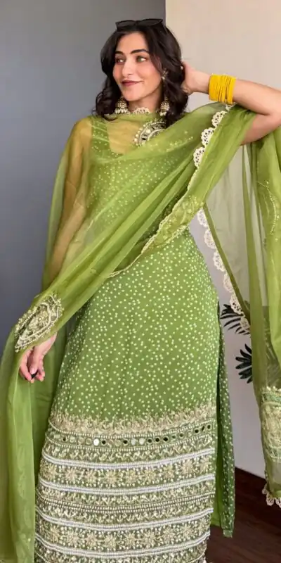 ST 1142 Green Faux Georgette Salwar Suit with Mirror Work & Embroidery Work. Introductory Price ₹2449. Delivery 4-6 Working Days. Shop now. | Jump Suits, Straight Suits, Casual Suits, Creative suits, Designer Suits, Palazzo Suits, Party Wear Suits, Patiala Suits, Salwar suit