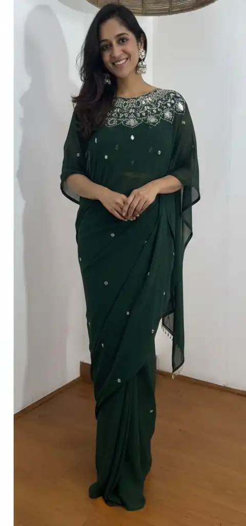 ST 1157 Green in Faux Georgette Mirror Work & Embroidery Work Saree. Festive Deal ₹1899. Delivery 4-6 Working Days. Shop now. | Bollywood Sarees, Creative Sarees, Designer Sarees, Embroidered Sarees, Ethnic Saree, Modern Digital sarees, Party Wear Sarees, Sarees