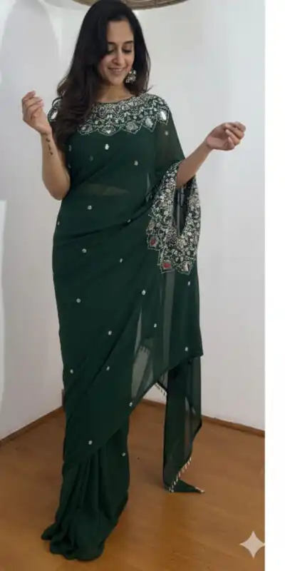 ST 1157 Green in Faux Georgette Mirror Work & Embroidery Work Saree. Festive Deal ₹1899. Delivery 4-6 Working Days. Shop now. | Bollywood Sarees, Creative Sarees, Designer Sarees, Embroidered Sarees, Ethnic Saree, Modern Digital sarees, Party Wear Sarees, Sarees