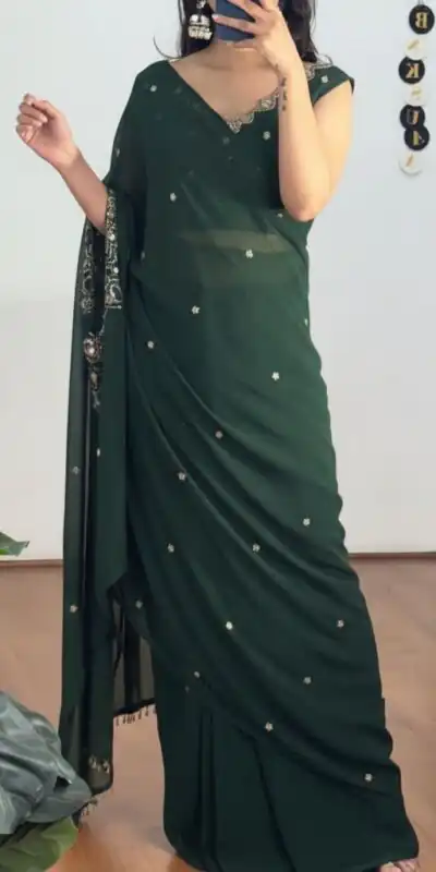 ST 1157 Green in Faux Georgette Mirror Work & Embroidery Work Saree. Festive Deal ₹1899. Delivery 4-6 Working Days. Shop now. | Bollywood Sarees, Creative Sarees, Designer Sarees, Embroidered Sarees, Ethnic Saree, Modern Digital sarees, Party Wear Sarees, Sarees