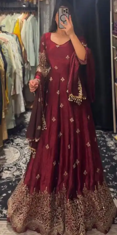 KD 1564 Maroon Fendy Silk Gown Perfect for Wedding, Party, Durga Puja, Festival Celebrations, Ganesh Chaturthi – . Best Price ₹2399. Delivery 4-6 Wor | Bollywood Gowns, Creative Gowns, Designer Gowns, Embroidered Gowns, Gowns, Party Wear Gowns