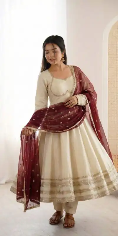 ZF 5017 Off White Cosmos Gold Gown with Embroidery Work & Lace Work. Get it for ₹2099. Delivery 4-6 Working Days. Shop now. | Bollywood Gowns, Creative Gowns, Designer Gowns, Embroidered Gowns, Gowns, Party Wear Gowns