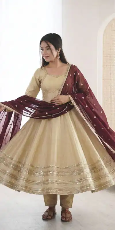 ZF 5017 Off White Cosmos Gold Gown with Embroidery Work & Lace Work. Get it for ₹2099. Delivery 4-6 Working Days. Shop now. | Bollywood Gowns, Creative Gowns, Designer Gowns, Embroidered Gowns, Gowns, Party Wear Gowns