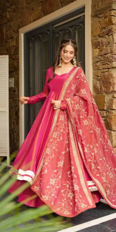 SRK 5289 Pink Roman Simmer Silk Border Work Gown. Wedding, Party, Festive, Events Grab it for ₹1649. Delivery 4-6 Working Days. Shop now. | Bollywood Gowns, Creative Gowns, Designer Gowns, Embroidered Gowns, Gowns, Party Wear Gowns