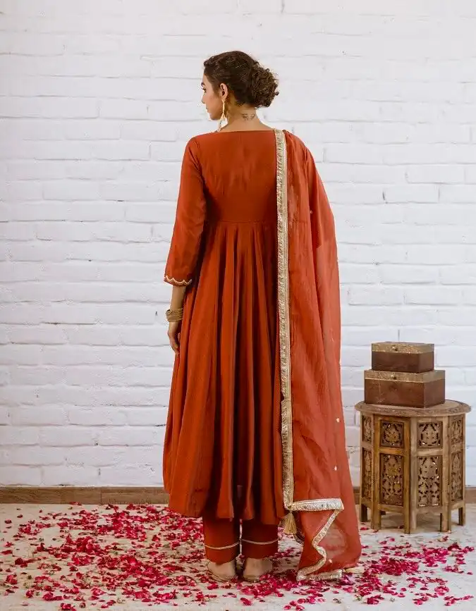 SRk 5324 Rust Color Vichitra silk Gown with Bead Work & Lace Work. Now at just ₹1849. Delivery 4-6 Working Days. Shop now. | Bollywood Gowns, Creative Gowns, Designer Gowns, Embroidered Gowns, Gowns, Party Wear Gowns