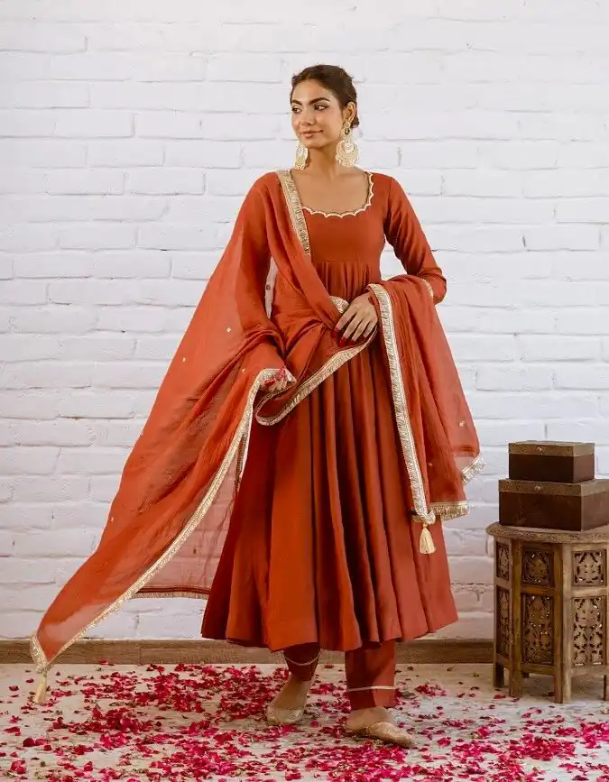 SRk 5324 Rust Color Vichitra silk Gown with Bead Work & Lace Work. Now at just ₹1849. Delivery 4-6 Working Days. Shop now. | Bollywood Gowns, Creative Gowns, Designer Gowns, Embroidered Gowns, Gowns, Party Wear Gowns