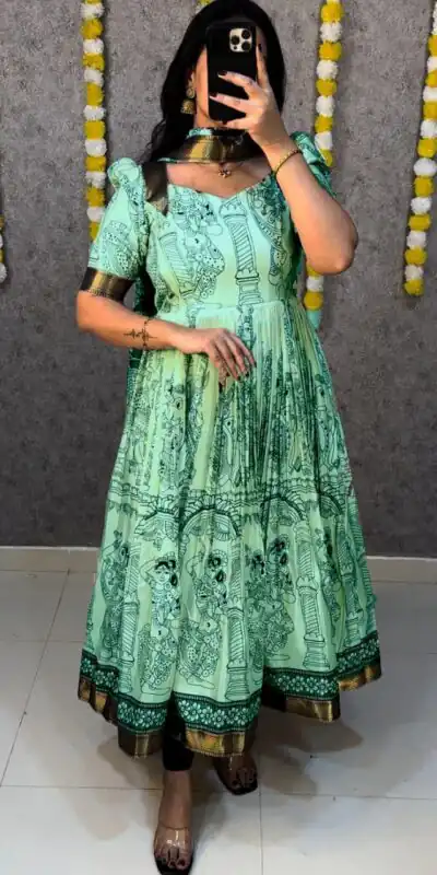 MF 666 Sea Green Malai Satin Gown with Digital Print & Kalamkari Print. Now at just ₹1499. Delivery 4-6 Working Days. Shop now. | Bollywood Gowns, Creative Gowns, Designer Gowns, Embroidered Gowns, Gowns, Party Wear Gowns