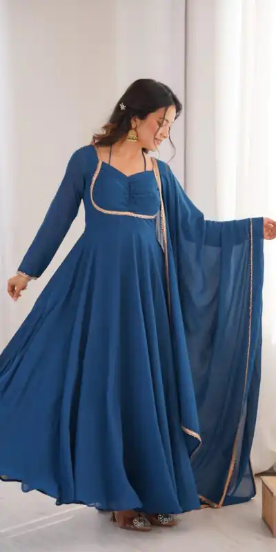 KB 291 Teal Color Fox Blooming Georgette Gown with Lace Work. Affordable Price ₹1899. Delivery 4-6 Working Days. Shop now. | Bollywood Gowns, Creative Gowns, Designer Gowns, Embroidered Gowns, Gowns, Party Wear Gowns